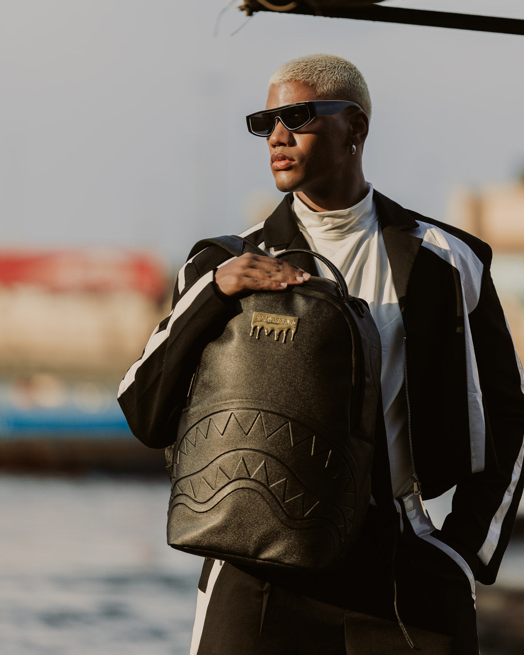 GOLD BRICK DRIP BLACK BACKPACK